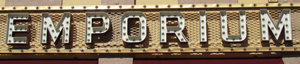 Sign over Emporium – Main Street