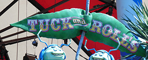 Sign to Tuck and Roll's Drive 'Em Buggies - a bug's land