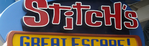 Sign to Stitch's Great Escape Attraction - Tomorrowland