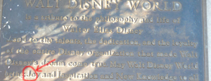 Dedication Plaque, left of Roy and Minnie,
on the bench behind the flag pole - Main Street USA